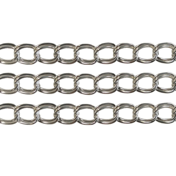 Silver-plated 4x6mm double loop link curb chain, shown in three parallel strands