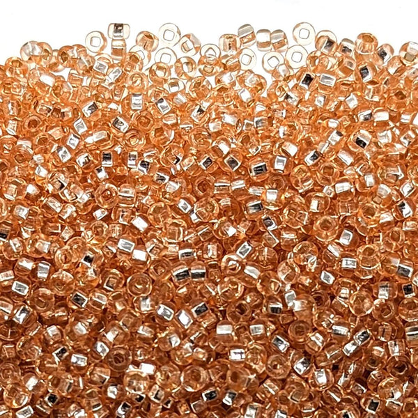 Preciosa Seed Beads 8/0, silver lined champagne
