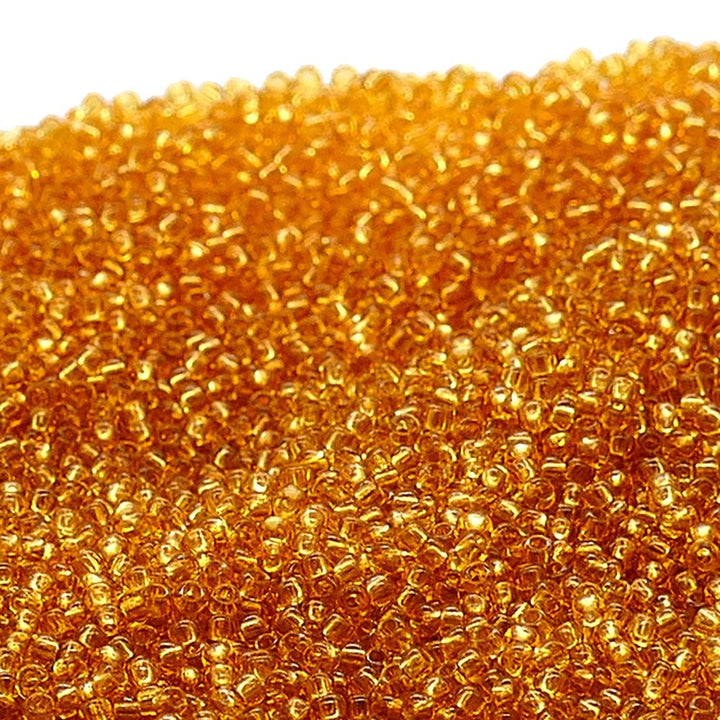 Preciosa Seed Beads 11/0, transparent topaz