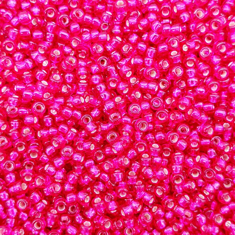 Miyuki Seed Beads 11/0, silver lined transparent raspberry