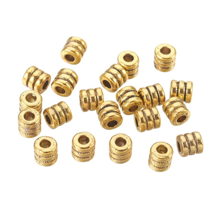Tibetan Style Beads Ridged Column 4mm, antique-gold-plated, additional photo