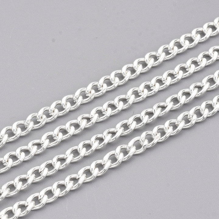 304 stainless steel curb chain, 4.5x3mm, silver colour, shown in four diagonal strands